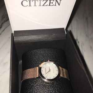 Brand new citizen women's watch in Rose gold mesh